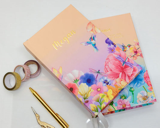 Floral notebook with decorative elements on a white background